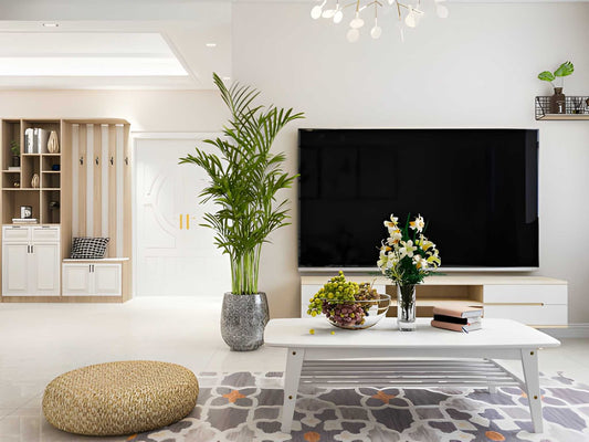 Plantas artificiales grandes para hogares modernos: consejos de estilo 2026 para terrazas, salones y oficinas